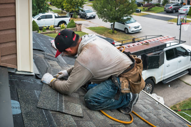 Professional Roofing technician working in Portland, MI